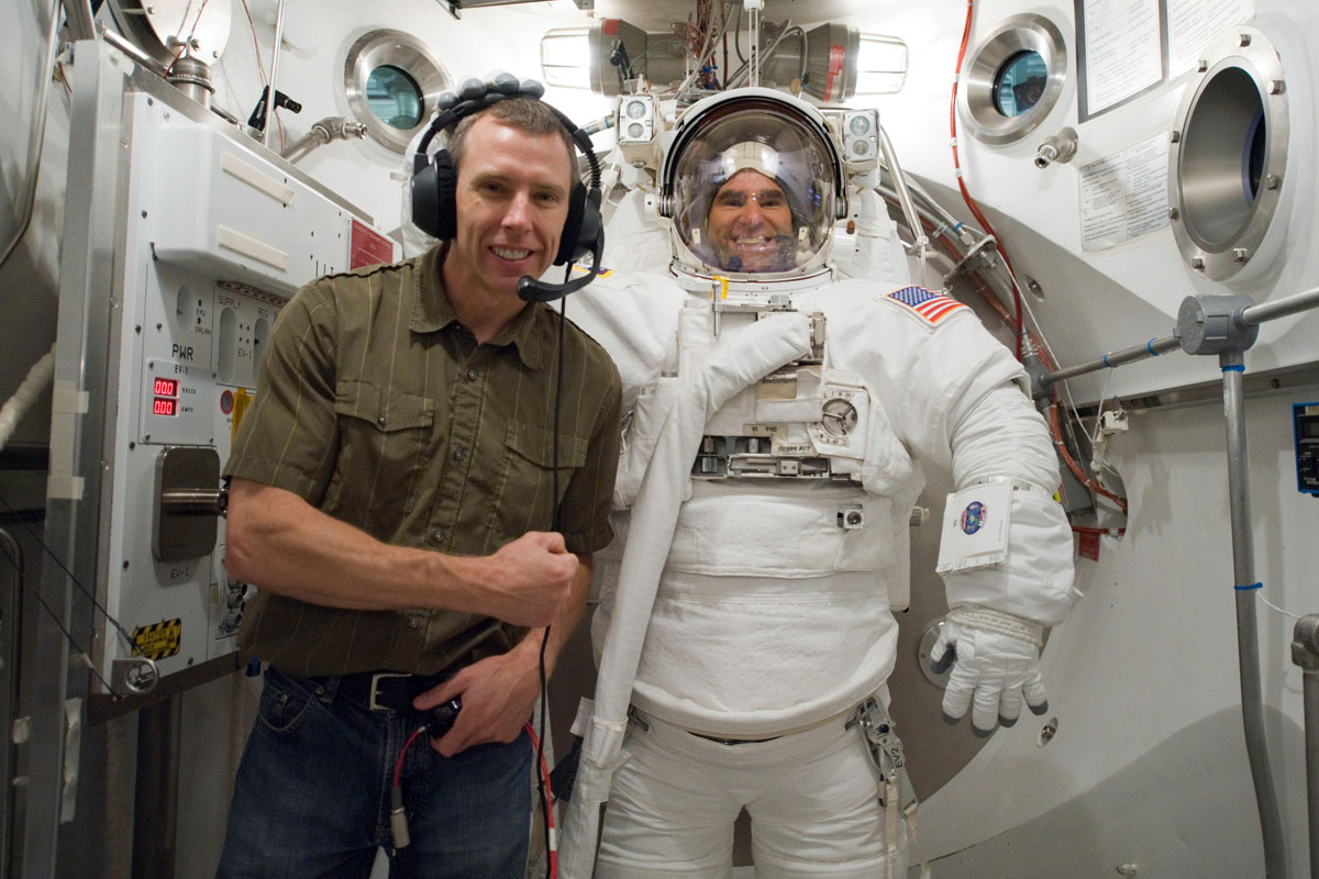 Shuttle Astronauts Perform Mission's First Spacewalk at Station
